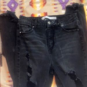 Black distressed skinny jeans